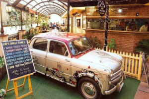 Café Simla Times in Shimla with cozy seating, coffee, and scenic hill views