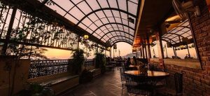 Cozy restaurant interior with scenic mountain views in Shimla